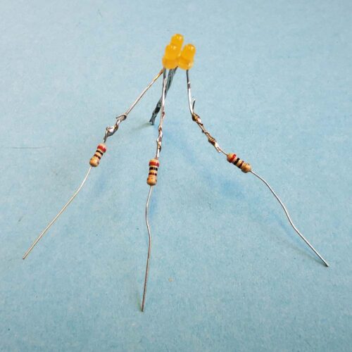 Resistors added to positive LED legs