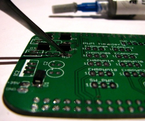 Placing SMD components using tweezers